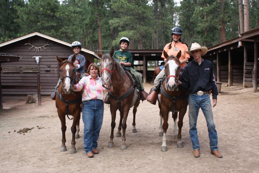 Jonathan, Robert and Nancy on Horseback