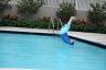 Robert dives in the pool