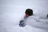Sledding through deep snow