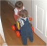 Robert pushes Jonathan in cart