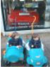 Robert and Jonathan in cars