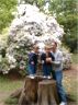 Jonathan,  Robert and Nancy by the tree stump
