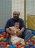 Jonathan and Dad play in the balls on Father's day