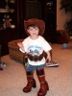 Jonathan tries on Sheila's boots and hat and belt