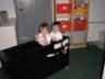 Robert and Jonathan play in the file cabinet