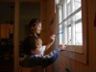 Nicole & Robert paint the window