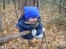 Jonathan climbs on a vine