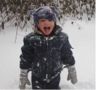 Robert sticks out his tongue for a snowflake