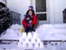 Jonathan, Ruth and Robert making a snow fort.
