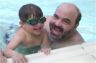 Robert and Dad swimming in the 3 ft. pool