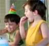Jonathan and Robert eat cake