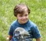 Robert sits on the grass
