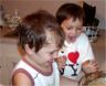 Robert & Jonathan help Mom bake a cake