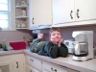 Robert lies on the counter while the coffee drips