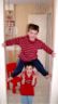 Robert gets high enough for Jonathan to walk underneath