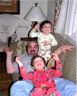 Jonathan, Dad and Robert watch TV before bed