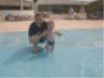 Robert's first dip in a pool.